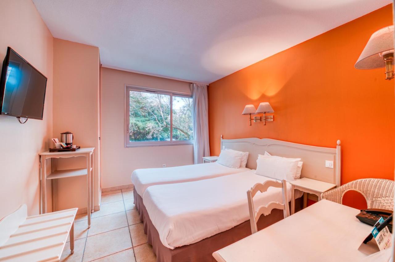 Logis NIMOTEL Hôtel Cosy Nîmes Exterior foto