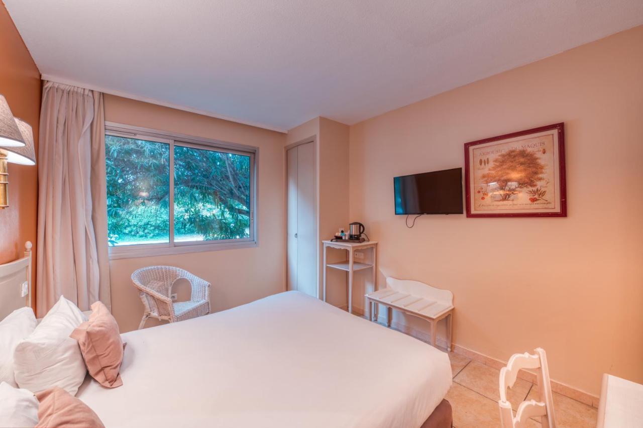 Logis NIMOTEL Hôtel Cosy Nîmes Exterior foto